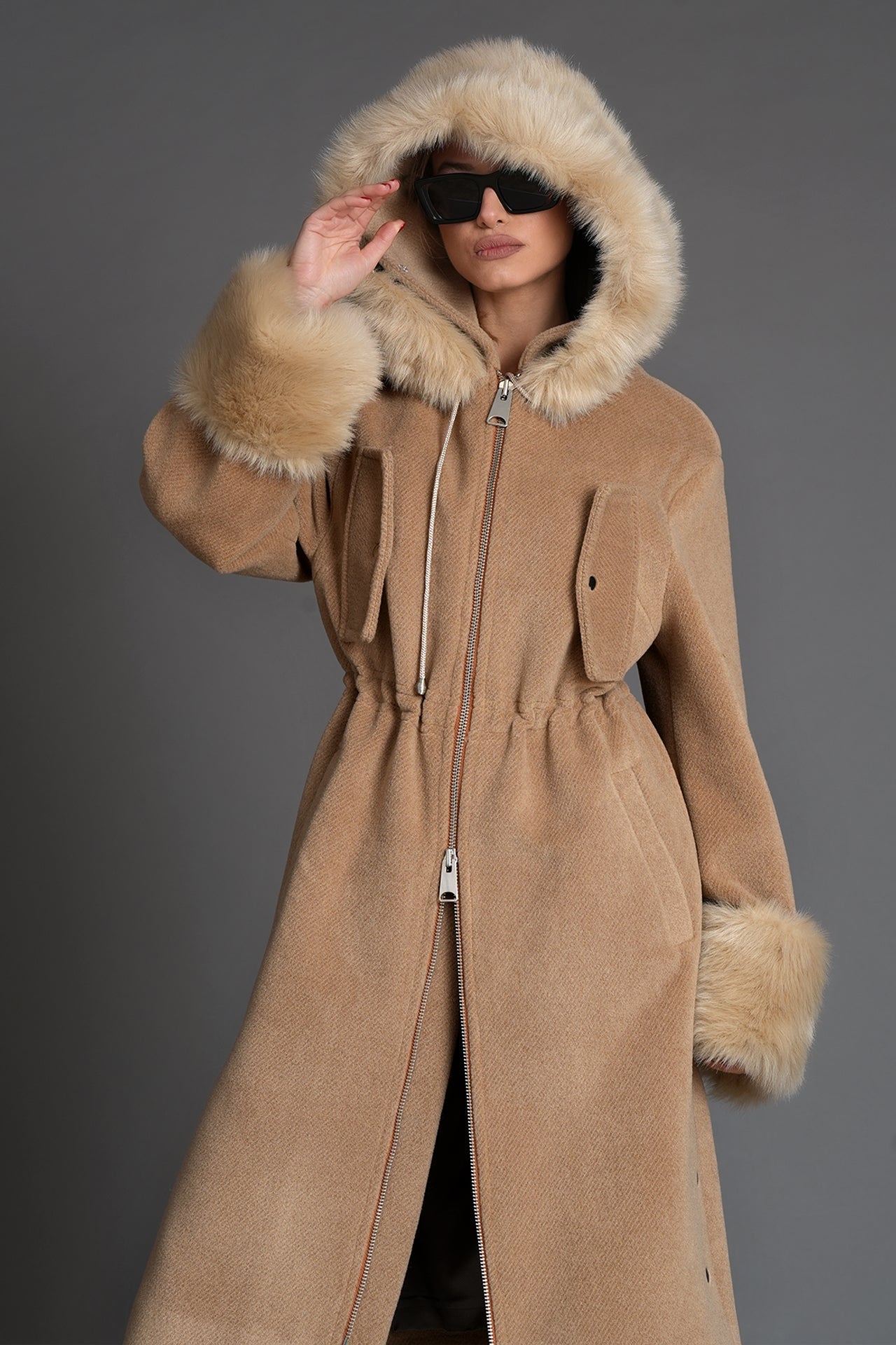 Bennato in camel parka coat